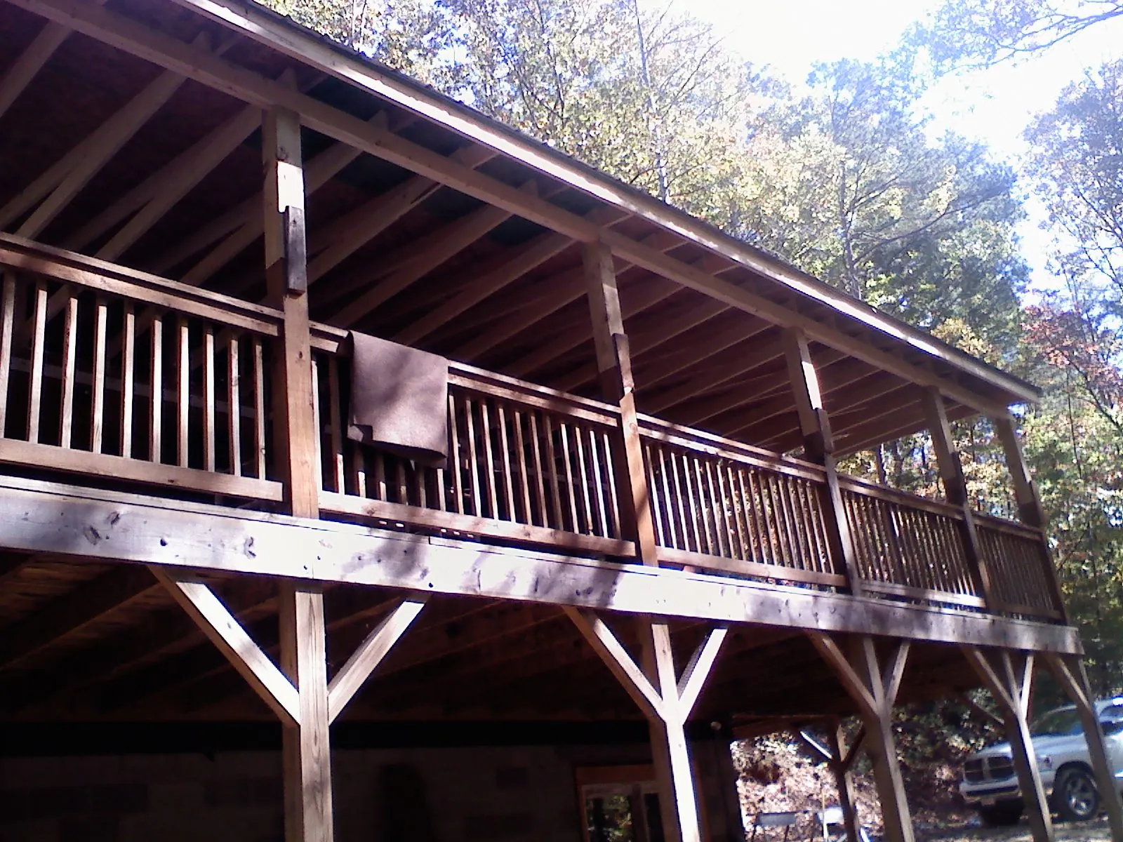 Timber framing under a new elevated porch and deck — Roof Leak Repair in Lake Elmo by Roofing Brothers
